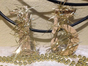 Using some pieces of gold garland and modge podge, I simply glued some sparkle on my "15" NYE decor.