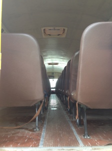 Before: Inside of the bus from the rear (28 seats)