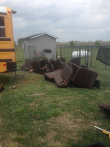 The school bus seat graveyard. The girls worked on getting all of the seat belts off. Only took them a day and a half, but they got them all! We are proud parents of a 9 and 6 year old girl that know how to use power tools:) They love helping build our tiny house!